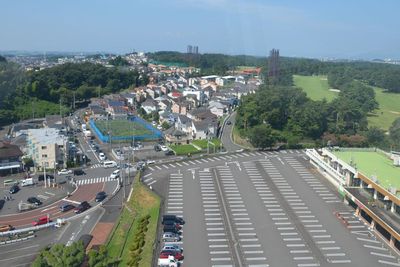 High angle view of vehicles on road in city