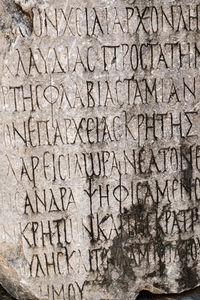 Close-up of text on wall