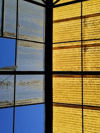 Full frame shot of glass window against building