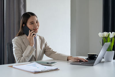 Businesswoman working at office