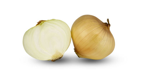 Close-up of pumpkins against white background