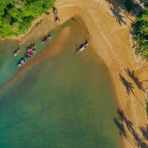Aerial view of boat moored at beach