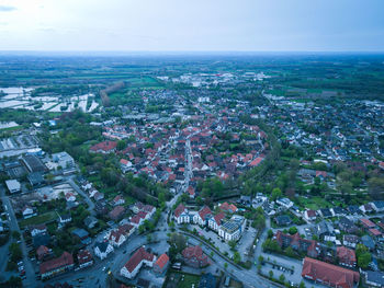 High angle shot of townscape against sky