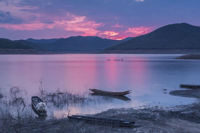 Scenic view of lake against sky during sunset