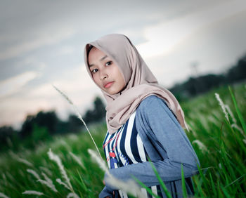 Portrait of girl on field