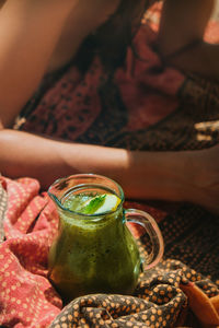 Close-up of hand holding drink