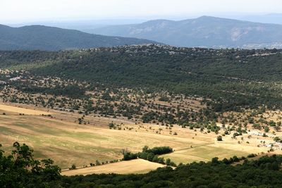 High angle view of field against mountains