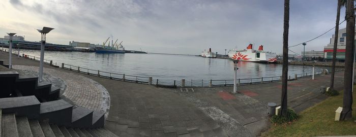 Panoramic view of harbor against sky