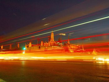 Light trails on city street at night