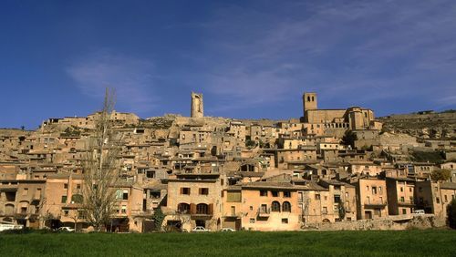 Houses at guimera against sky