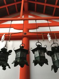 Low angle view of lanterns hanging on ceiling