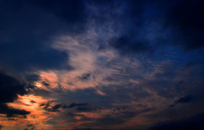 Low angle view of dramatic sky at sunset