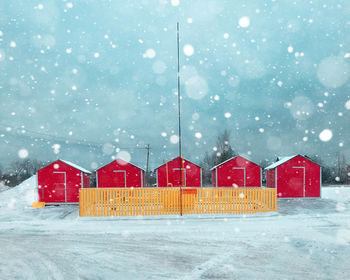 House on snow covered field