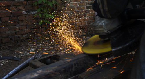 Man working on metal in factory