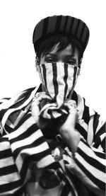 Portrait of man holding umbrella