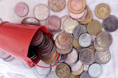 High angle view of coins on table