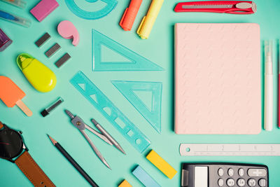 Directly above shot of school supplies on table