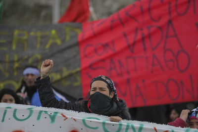 Protestors protesting with banners outdoors