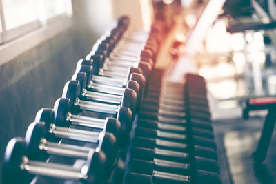 Close-up of dumbbells in gym