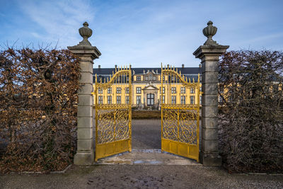 Entrance of historic building against sky