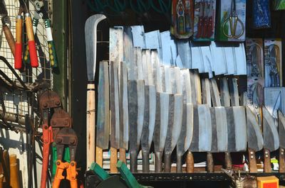 Various knives and tools for sale at market stall