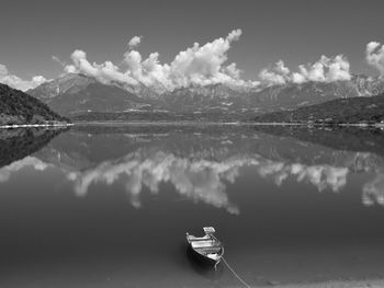 Boats in calm lake