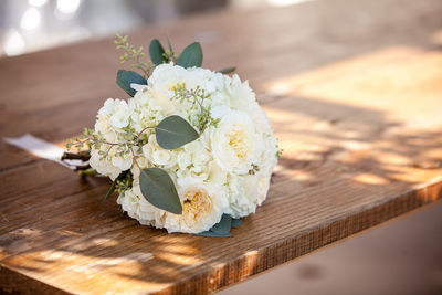 Close-up of white rose on table