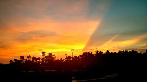 Scenic view of landscape against cloudy sky