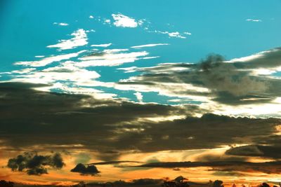 Low angle view of dramatic sky during sunset