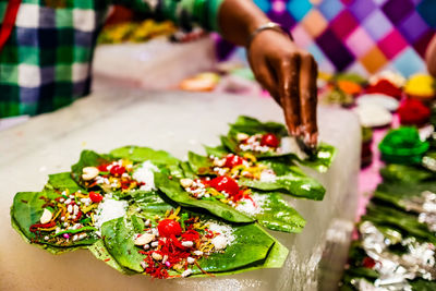 Close-up of hand holding vegetables