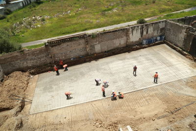 Woman standing against wall