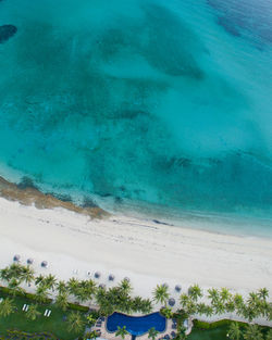 Scenic view of sea against blue sky