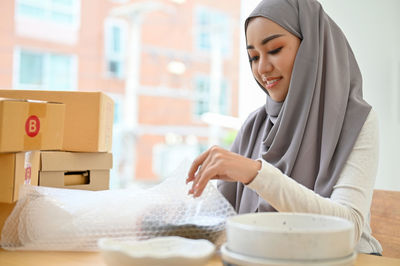 Businesswoman in hijab working at office