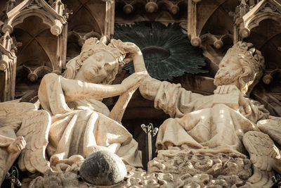 Close-up of statues in old building