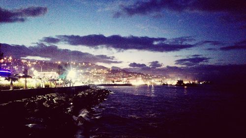 Scenic view of sea against sky at night