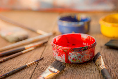 Close-up of paintbrushes on table