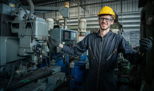 Portrait of man working in factory