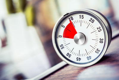 Close-up of dial on table