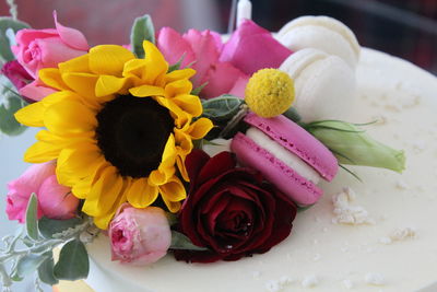 Close-up of pink flowers on table