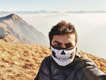 Man against mountains
