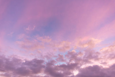 Low angle view of dramatic sky during sunset