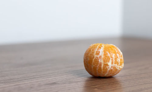 Close-up of orange fruit on table