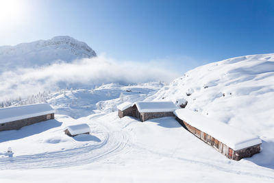 Snow covered mountain against sky