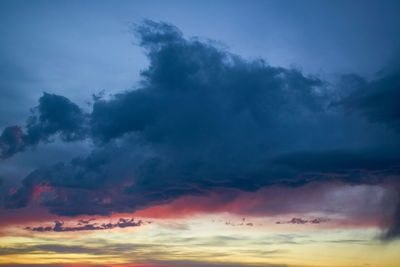 Low angle view of dramatic sky during sunset