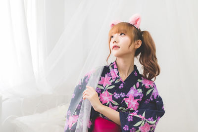 Portrait of cute girl at home