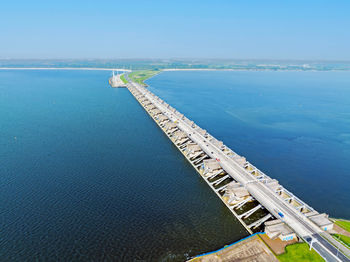 High angle view of sea against blue sky