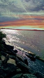 Scenic view of sea at sunset