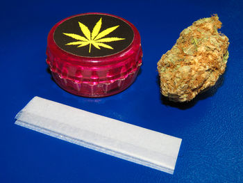 High angle view of drink on table against blue background