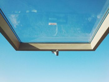Low angle view of building against blue sky