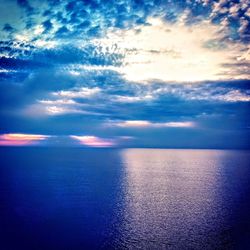 Scenic view of sea against sky at sunset